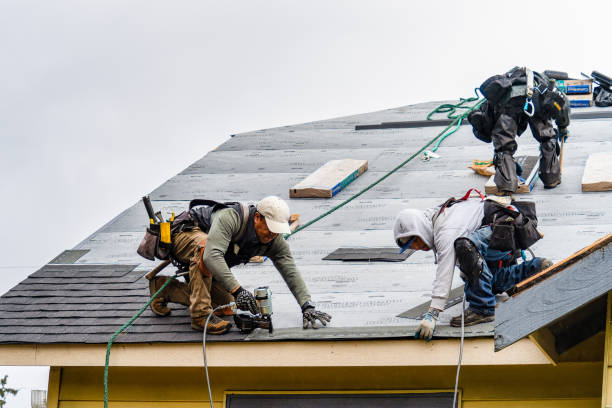 Professional Roofing technician working in Tyngsboro, MA